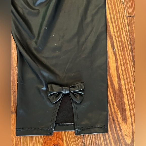 TORRID Faux Leather Black Cropped Leggings Bow Accents On Back - Picture 8 of 10